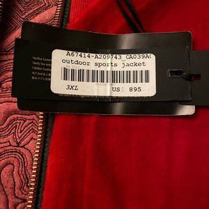 Red Medusa Versace jacket.